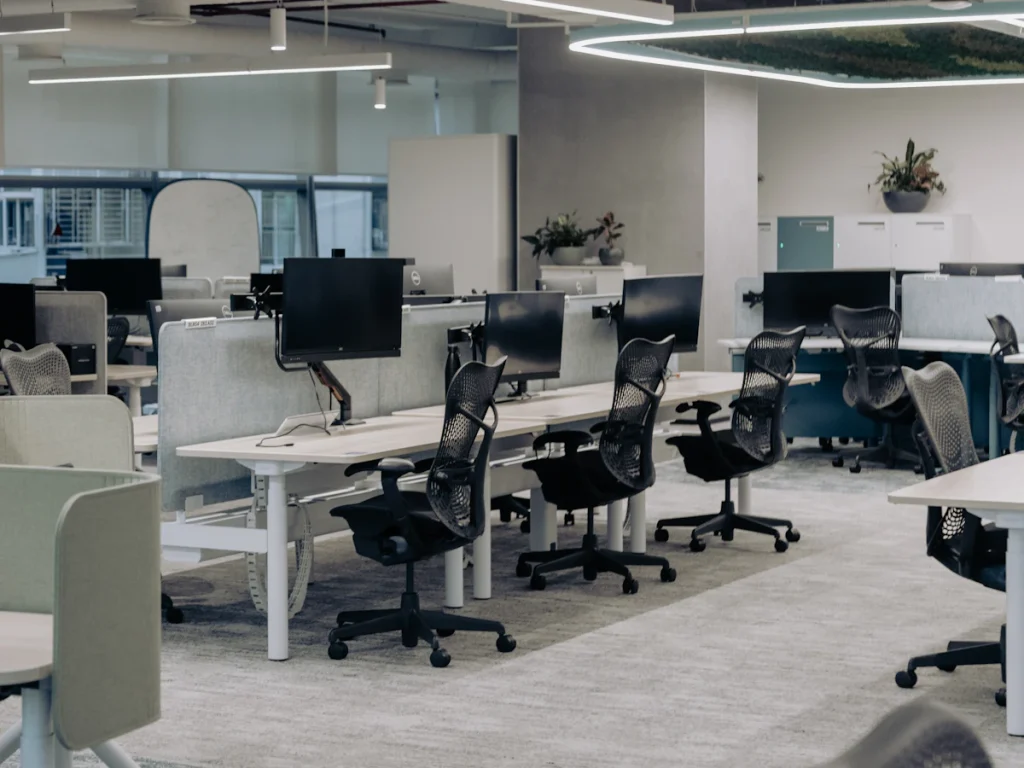 Open-plan office interior with desks and chairs